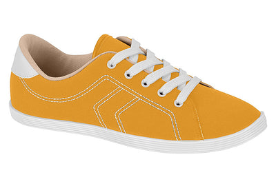 Yellow sneaker with white laces on a white background