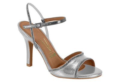 Silver high-heeled sandal with rhinestone details on a white background