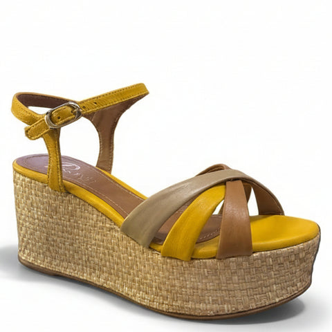 Yellow and brown wedge sandal on a white background