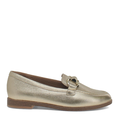 Gold loafer shoe on a white background